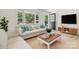 Cozy living room with a sectional sofa, and hardwood floors at 306 2Nd Avenue Ne Pl, Conover, NC 28613