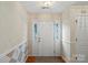 Welcoming entryway with tiled accents, wooden floors, and a view into the home at 3114 Pine Pointe St, Matthews, NC 28104