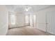 Spacious main bedroom with ample natural light, plush carpet, and neutral walls at 3114 Pine Pointe St, Matthews, NC 28104