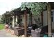 A covered back patio offers seating and grilling space for outdoor enjoyment at 3136 Blueberry Dr, Monroe, NC 28110