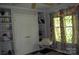 Bright bedroom featuring a storage closet, large window and built in shelving at 3136 Blueberry Dr, Monroe, NC 28110