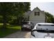 Home exterior featuring a driveway with two cars and attached garage at 3136 Blueberry Dr, Monroe, NC 28110