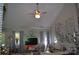 Bright living room featuring high ceilings, ample natural light, and stylish decorations at 3136 Blueberry Dr, Monroe, NC 28110
