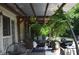 Cozy covered patio featuring outdoor seating, a ceiling fan, and a grilling area at 3136 Blueberry Dr, Monroe, NC 28110