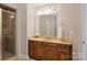 Bathroom boasts a walk-in shower, framed mirror, and a spacious vanity at 3284 Millstone Creek Rd, Lancaster, SC 29720
