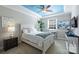Cozy bedroom features a striking blue ceiling, complemented by natural light and neutral decor at 3284 Millstone Creek Rd, Lancaster, SC 29720