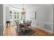 Bright dining room featuring large windows and an elegant chandelier at 3284 Millstone Creek Rd, Lancaster, SC 29720