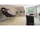 Large game room with basketball game and painted art at 3284 Millstone Creek Rd, Lancaster, SC 29720