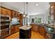 Spacious kitchen featuring granite countertops and stainless steel appliances at 3284 Millstone Creek Rd, Lancaster, SC 29720