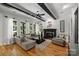 Spacious living room boasting hardwood floors, fireplace, and natural light at 3284 Millstone Creek Rd, Lancaster, SC 29720