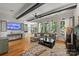 Bright living room offering hardwood floors, fireplace, and open layout at 3284 Millstone Creek Rd, Lancaster, SC 29720