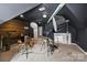 Bright studio with professional lighting equipment and a wood accent wall at 3284 Millstone Creek Rd, Lancaster, SC 29720
