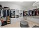 Organized walk-in closet featuring shelves and hanging racks for clothing and accessories at 3284 Millstone Creek Rd, Lancaster, SC 29720