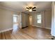 Bedroom featuring hardwood floors, neutral walls, and a ceiling fan at 339 Mayflower Ave, Cramerton, NC 28032