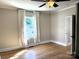 Bedroom with hardwood floors and a view of the window at 339 Mayflower Ave, Cramerton, NC 28032