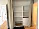 Closet with multiple shelves and curtain door at 339 Mayflower Ave, Cramerton, NC 28032