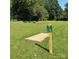Disc golf course with the first tee pad and signage for an enjoyable outdoor activity at 339 Mayflower Ave, Cramerton, NC 28032