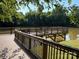 Scenic riverfront dock offering a serene spot for relaxation and outdoor enjoyment at 339 Mayflower Ave, Cramerton, NC 28032