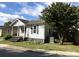 Charming home featuring a covered porch and mature landscaping at 339 Mayflower Ave, Cramerton, NC 28032