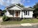 Charming single-story home with inviting front porch and well-maintained yard at 339 Mayflower Ave, Cramerton, NC 28032