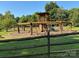 A well maintained playground with wooden structures, perfect for outdoor fun and recreation at 339 Mayflower Ave, Cramerton, NC 28032