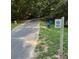 Scenic trail along the Carolina Thread with a bench providing a peaceful spot to relax and enjoy nature at 339 Mayflower Ave, Cramerton, NC 28032