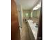 Full bathroom with long vanity, ample counterspace, shower, and tile flooring at 34393 Springdale Dr, New London, NC 28127