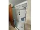 Updated shower featuring glass door, built-in shelves, and modern showerhead at 34393 Springdale Dr, New London, NC 28127