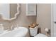 The well-lit powder room features modern fixtures and a stylish vanity at 3701 Methodist Church Ln, Waxhaw, NC 28173