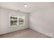 Cozy bedroom featuring a large window providing natural light at 3701 Methodist Church Ln, Waxhaw, NC 28173