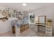 Bedroom featuring built in bed, window and a desk with decorations at 3701 Methodist Church Ln, Waxhaw, NC 28173