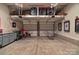 Spacious two-car garage with epoxy floors, storage systems, and plenty of room for parking and hobbies at 3701 Methodist Church Ln, Waxhaw, NC 28173