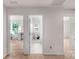 Hallway with open doorways to rooms, carpet floors and fresh neutral paint colors throughout at 3701 Methodist Church Ln, Waxhaw, NC 28173