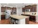 The kitchen is equipped with stainless appliances, generous counter space, and a central island at 3701 Methodist Church Ln, Waxhaw, NC 28173