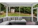 Relax on this screened porch, with a view of the beautifully landscaped backyard at 3701 Methodist Church Ln, Waxhaw, NC 28173