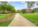 Long driveway leading to a stunning two-story brick home at 3706 Song Sparrow Dr, Matthews, NC 28104