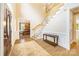 Elegant foyer with staircase, hardwood floors and classic decor at 3706 Song Sparrow Dr, Matthews, NC 28104