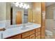 The bathroom has a vanity with a sink, mirror and a lot of drawers at 37156 Southside Rd, Albemarle, NC 28001