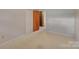Spacious bedroom with neutral walls and carpet at 37156 Southside Rd, Albemarle, NC 28001