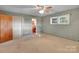 Bedroom with ceiling fan, neutral paint, and ample natural light at 37156 Southside Rd, Albemarle, NC 28001