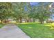 Wide driveway leads to this charming brick home with a well-manicured lawn and mature trees at 37156 Southside Rd, Albemarle, NC 28001
