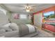 Beautiful main bedroom with decoratively painted walls and a ceiling fan at 37156 Southside Rd, Albemarle, NC 28001