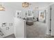 Spacious living room featuring a comfortable sectional sofa, neutral walls and ample natural light at 3735 Ernie Dr, Charlotte, NC 28269