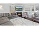 Comfortable living room featuring a fireplace, plush seating, and stylish decor at 3735 Ernie Dr, Charlotte, NC 28269