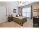 Cozy bedroom featuring neutral colors, a comfortable bed, and natural light from the window at 385 Willow Tree Dr, Rock Hill, SC 29732