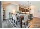 Inviting dining room adjacent to a modern kitchen, perfect for Gathering meals and entertaining guests at 385 Willow Tree Dr, Rock Hill, SC 29732