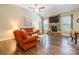 Cozy living room with fireplace, vaulted ceiling, hardwood floors, and natural light at 385 Willow Tree Dr, Rock Hill, SC 29732