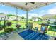 Relaxing screened porch with outdoor seating and a view of the fenced backyard at 385 Willow Tree Dr, Rock Hill, SC 29732