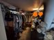 Walk-in closet offering ample storage space with clothing racks and shelving at 4059 10Th Avenue Sw Dr, Hickory, NC 28602