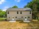New home featuring a large backyard and a patio space at 445 Faith Sw Dr, Concord, NC 28027